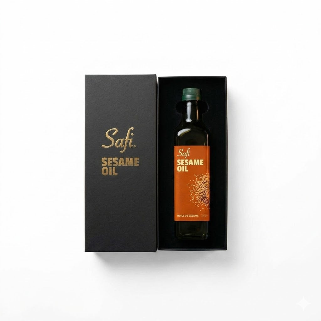 Safi Sesame Oil bottle in a black box on a white background